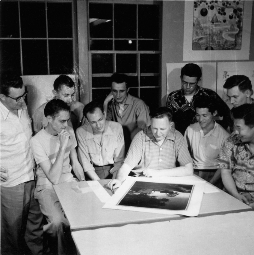 Bruce Goff confers with students in the early 1950s in Building 604 on the North Base